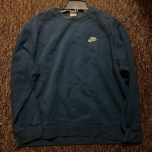 Blue Nike crew neck sweater